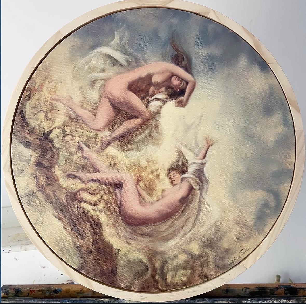Circular painting of two figures floating in a sky-like composition