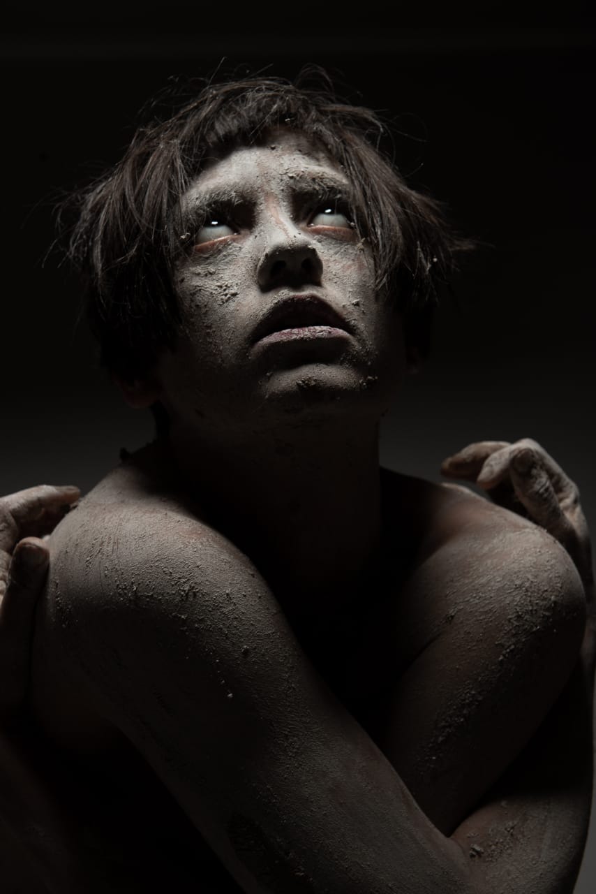 Intense portrait — dust and light